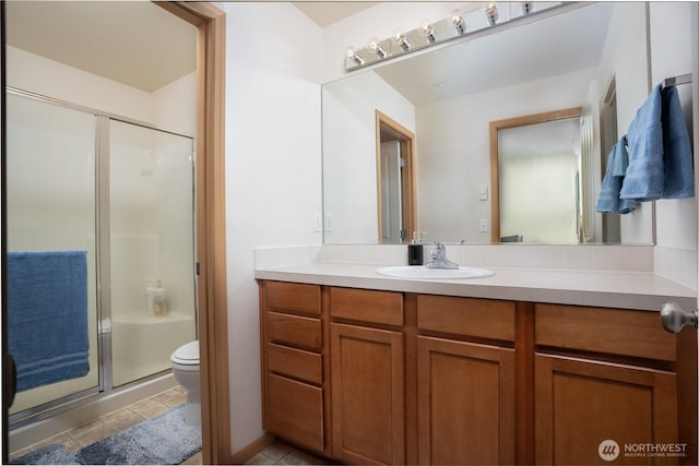 6018 Illinois Ln SE Unit B, Lacey, WA 98513 - full bath with a shower stall, toilet, vanity, and tile patterned floors