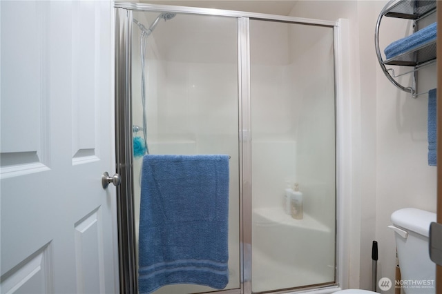 6018 Illinois Ln SE Unit B, Lacey, WA 98513 - bathroom featuring toilet and a stall shower