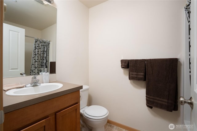 6018 Illinois Ln SE Unit B, Lacey, WA 98513 - full bath featuring vanity, toilet, and a shower with shower curtain