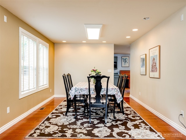1717 24th Ave Court SE, Puyallup, WA 98374 - dining room featuring wood finished floors, recessed lighting, and baseboards