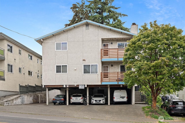 6710 24th Ave NW, Seattle, WA 98117 - view of property featuring covered parking