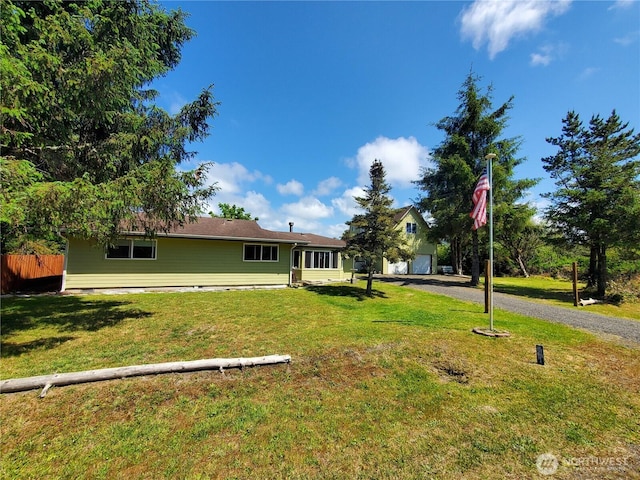 248 Ensign Ave NW, Ocean Shores, WA 98569 - view of yard with asphalt driveway