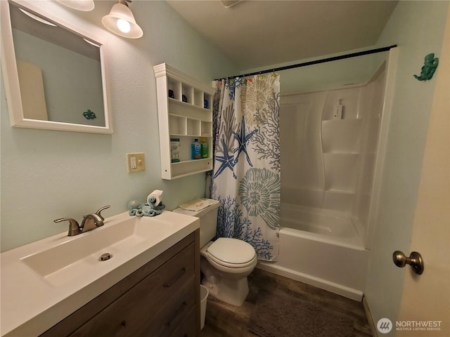248 Ensign Ave NW, Ocean Shores, WA 98569 - bathroom with toilet, shower / tub combo, wood finished floors, and vanity