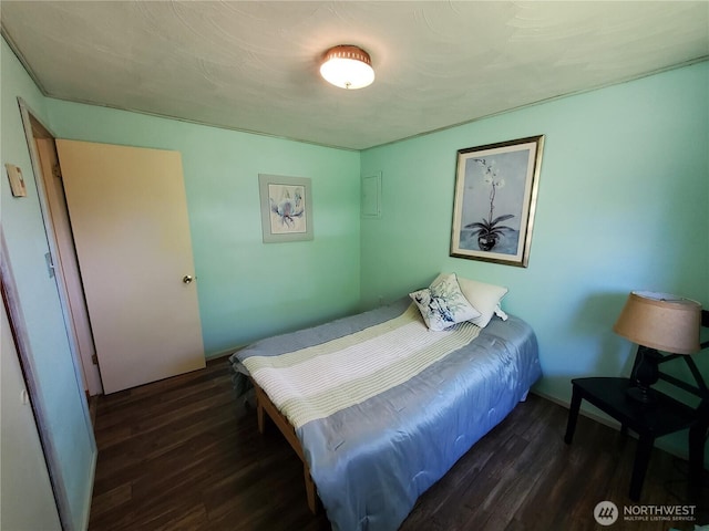 248 Ensign Ave NW, Ocean Shores, WA 98569 - bedroom with dark wood finished floors