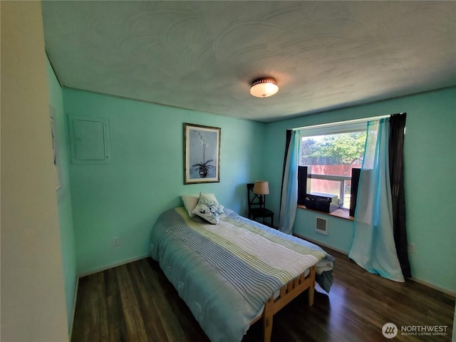 248 Ensign Ave NW, Ocean Shores, WA 98569 - bedroom with wood finished floors and baseboards