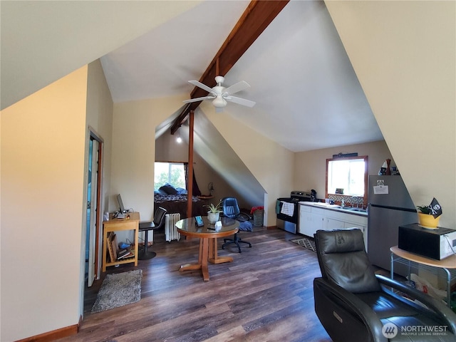 248 Ensign Ave NW, Ocean Shores, WA 98569 - office with plenty of natural light, ceiling fan, dark wood finished floors, and radiator
