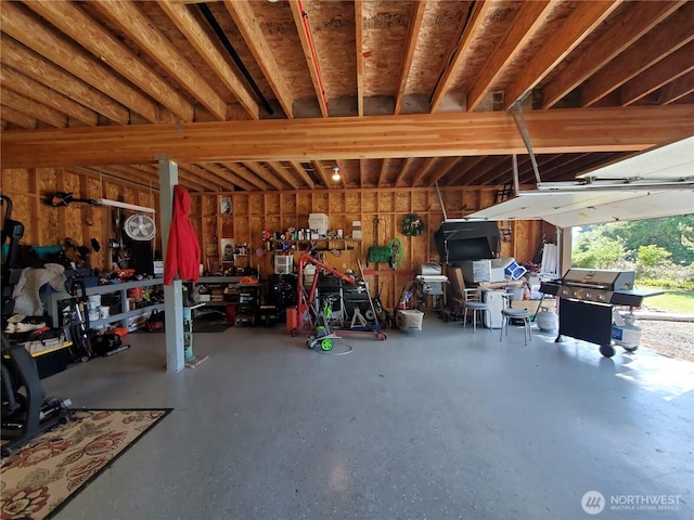 248 Ensign Ave NW, Ocean Shores, WA 98569 - garage featuring a workshop area