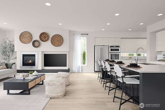 4171 Wandering Way, Port Orchard, WA 98367 - living room featuring recessed lighting and light wood-type flooring