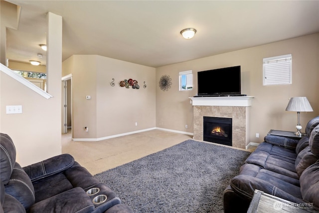 9831 198th St E, Graham, WA 98338 - living room featuring carpet, baseboards, and a fireplace