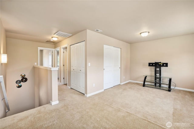9831 198th St E, Graham, WA 98338 - workout room featuring carpet flooring and baseboards