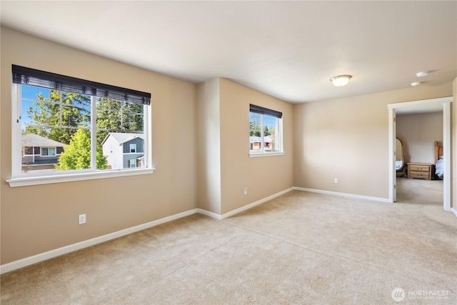 9831 198th St E, Graham, WA 98338 - unfurnished room featuring light carpet and baseboards