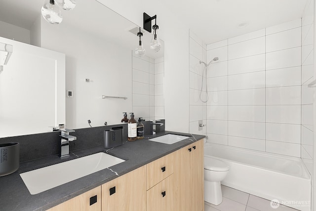 8337 14th Ave NW Unit A, Seattle, WA 98117 - full bath with toilet, double vanity, shower / tub combination, and tile patterned flooring