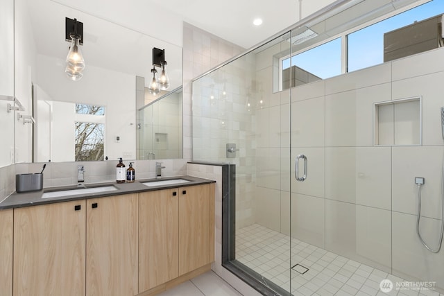 8337 14th Ave NW Unit A, Seattle, WA 98117 - bathroom with healthy amount of natural light, double vanity, and a shower stall