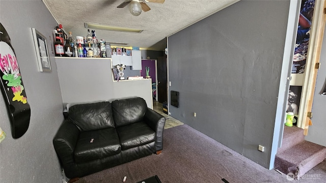 107 Carrolls Ave, Carrolls, WA 98609 - sitting room featuring a textured ceiling, a ceiling fan, and carpet flooring