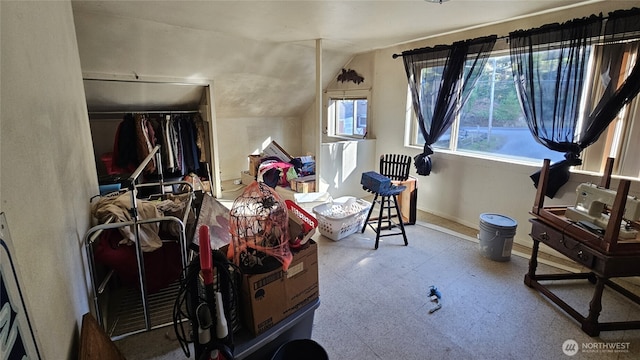 107 Carrolls Ave, Carrolls, WA 98609 - bedroom with lofted ceiling, tile patterned floors, baseboards, and a closet
