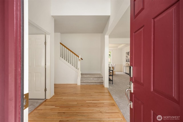 23600 Dunbar Pl NW, Poulsbo, WA 98370 - entrance foyer with stairway and light wood-style flooring
