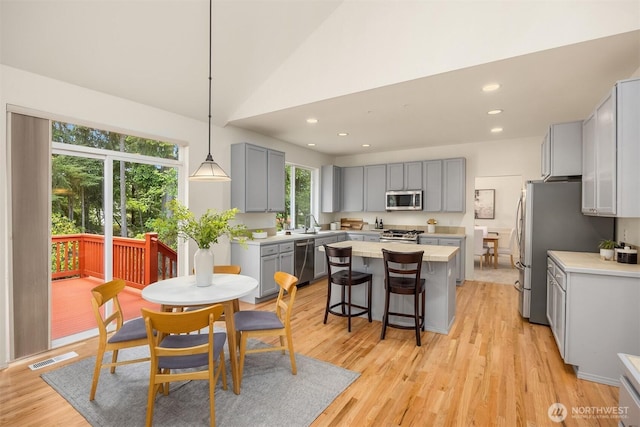 23600 Dunbar Pl NW, Poulsbo, WA 98370 - dining room featuring light wood-style flooring and recessed lighting