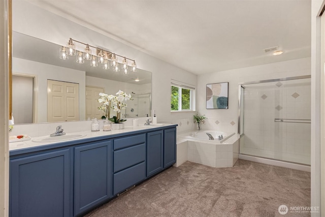 23600 Dunbar Pl NW, Poulsbo, WA 98370 - full bathroom with a stall shower, double vanity, and a bath
