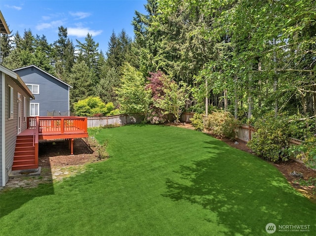 23600 Dunbar Pl NW, Poulsbo, WA 98370 - fenced backyard featuring a wooden deck and stairway