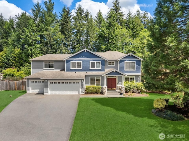 23600 Dunbar Pl NW, Poulsbo, WA 98370 - view of front of property with driveway, a garage, and a shingled roof