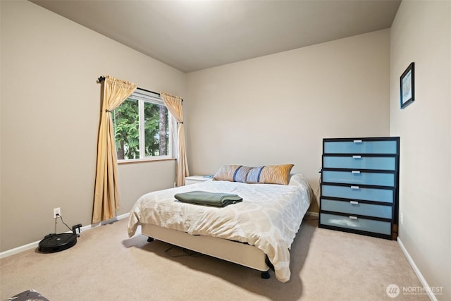 14647 NW Honeyhill Loop, Seabeck, WA 98380 - bedroom with light colored carpet and baseboards