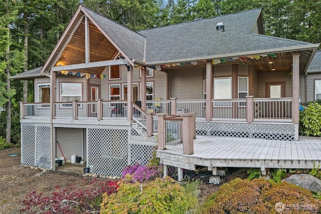 14647 NW Honeyhill Loop, Seabeck, WA 98380 - rear view of property with roof with shingles and a deck