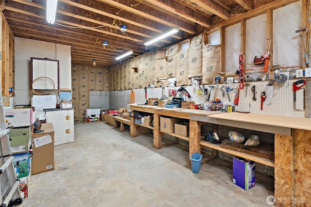 14647 NW Honeyhill Loop, Seabeck, WA 98380 - below grade area with a workshop area