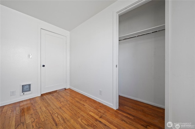 177 E St SE, Ephrata, WA 98823 - unfurnished bedroom with a closet, wood finished floors, and baseboards