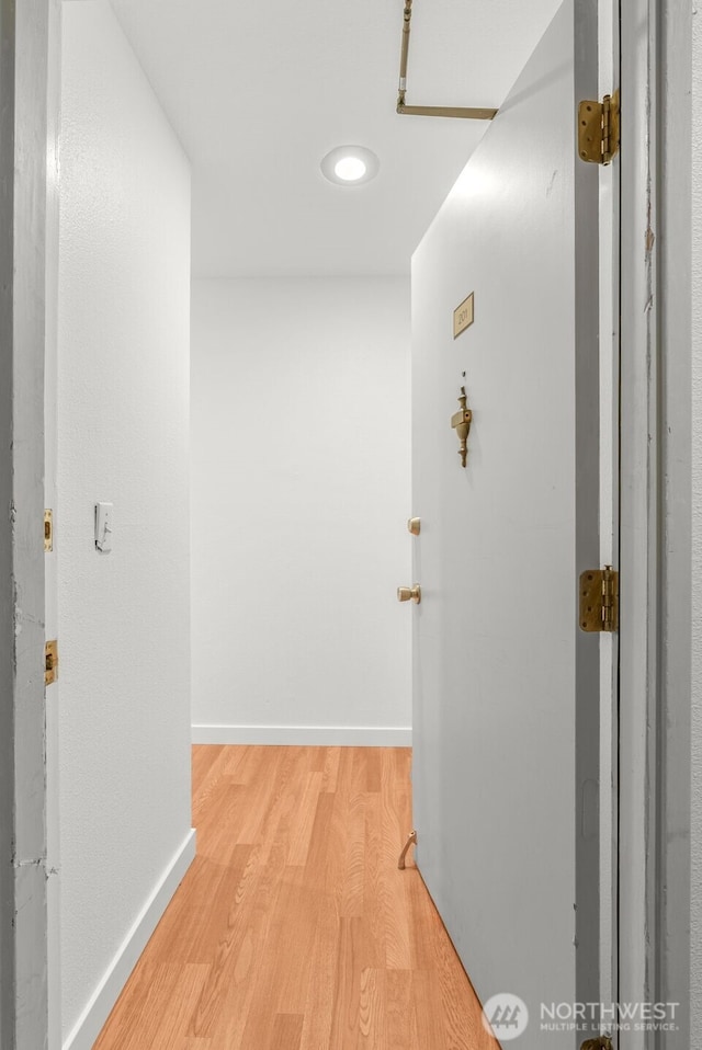 10329 Meridian Ave N Unit A201, Seattle, WA 98133 - hall featuring light wood-type flooring, baseboards, and recessed lighting