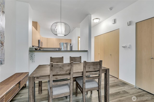 14525 1st Ln NE Unit C, Duvall, WA 98019 - dining room featuring light wood-style flooring