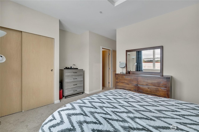 14525 1st Ln NE Unit C, Duvall, WA 98019 - carpeted bedroom featuring a closet and baseboards