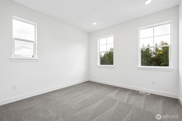 15612 210th Ave E Unit 313, Bonney Lake, WA 98391 - unfurnished room featuring baseboards, carpet, and recessed lighting