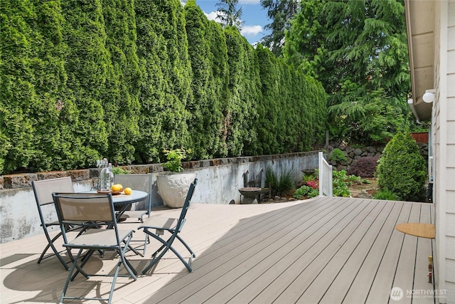 1402 E Lake Dr, Bremerton, WA 98312 - wooden deck with outdoor dining area