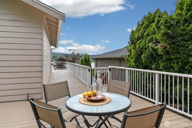 1402 E Lake Dr, Bremerton, WA 98312 - wooden terrace with outdoor dining space