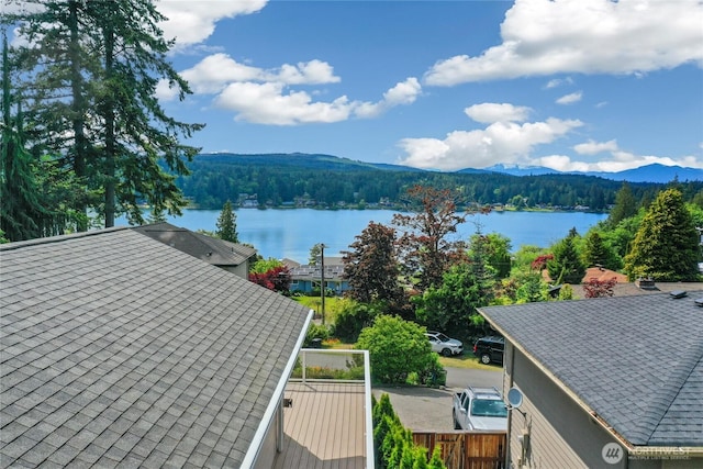 1402 E Lake Dr, Bremerton, WA 98312 - water view with a mountainous background and a forest
