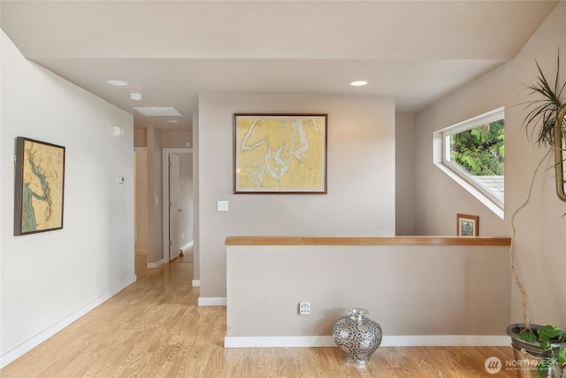 1402 E Lake Dr, Bremerton, WA 98312 - corridor with light wood-style floors and baseboards