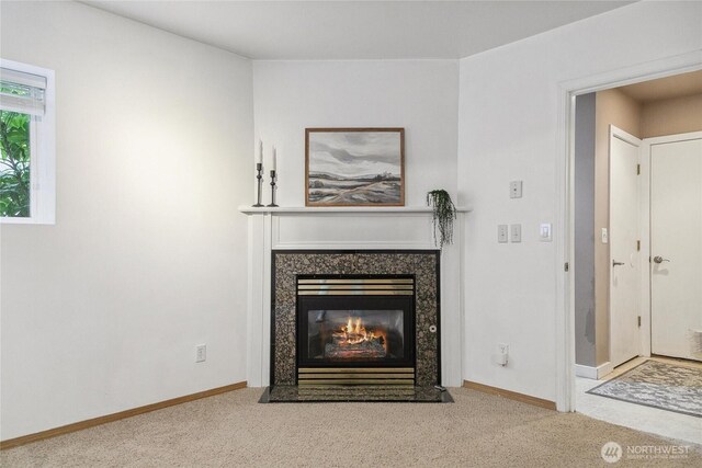 1402 E Lake Dr, Bremerton, WA 98312 - detailed view of carpet floors, a fireplace with flush hearth, and baseboards