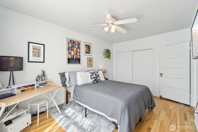 22 John St Unit 10, Seattle, WA 98109 - bedroom with wood finished floors, a closet, and ceiling fan