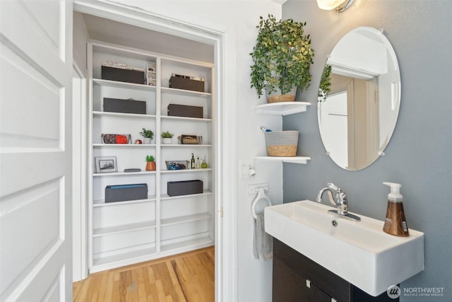 22 John St Unit 10, Seattle, WA 98109 - bathroom with wood finished floors and vanity