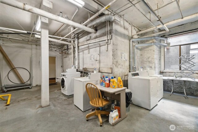 22 John St Unit 10, Seattle, WA 98109 - unfinished basement featuring independent washer and dryer