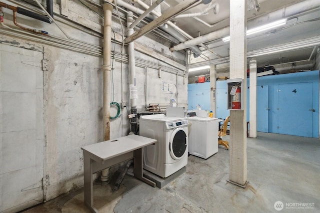 22 John St Unit 10, Seattle, WA 98109 - unfinished below grade area featuring washing machine and dryer