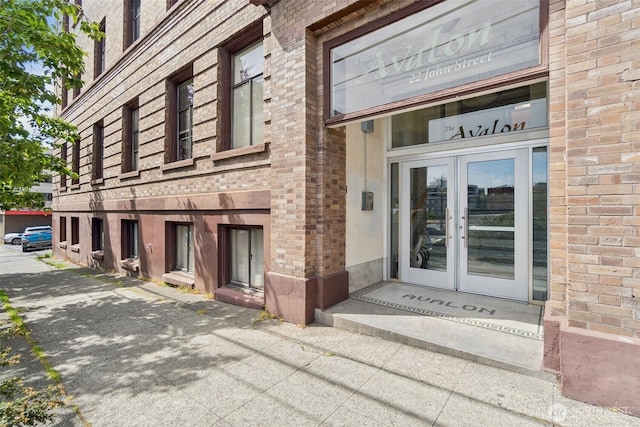 22 John St Unit 10, Seattle, WA 98109 - view of exterior entry featuring brick siding