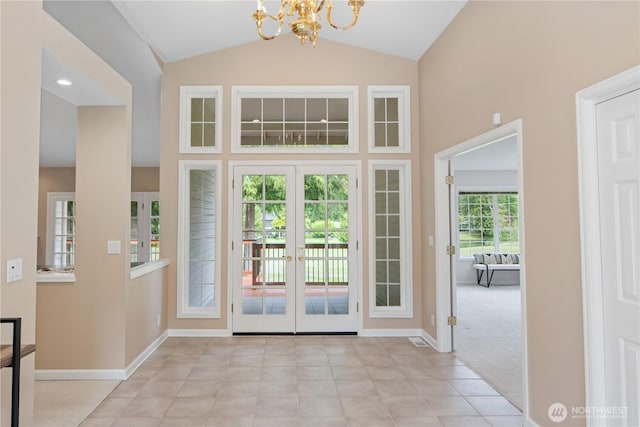 211 Greenview Ln, Port Ludlow, WA 98365 - doorway with a chandelier, french doors, baseboards, and high vaulted ceiling