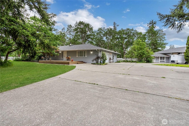 4716 266th St E, Spanaway, WA 98387 - view of front of property with concrete driveway and a porch