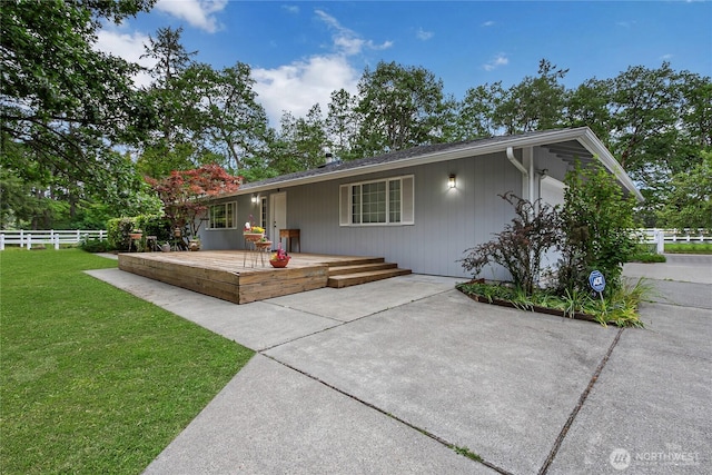 4716 266th St E, Spanaway, WA 98387 - single story home featuring a deck and a patio area