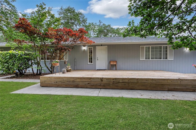 4716 266th St E, Spanaway, WA 98387 - view of front facade with a deck and a front lawn