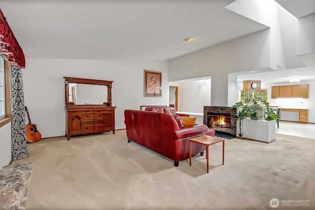 4716 266th St E, Spanaway, WA 98387 - living area with light colored carpet and a fireplace with flush hearth