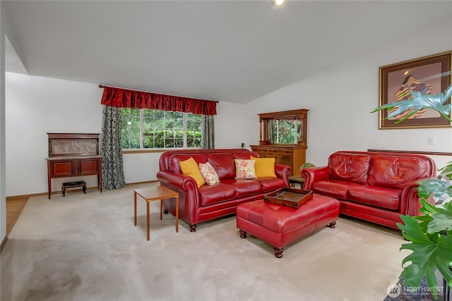 4716 266th St E, Spanaway, WA 98387 - carpeted living room featuring vaulted ceiling and baseboards