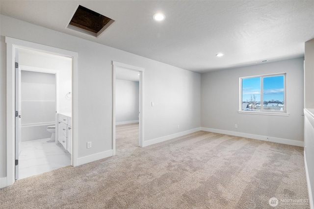 4223 W Sandy Ct, Moses Lake, WA 98837 - spare room featuring light carpet, recessed lighting, and baseboards