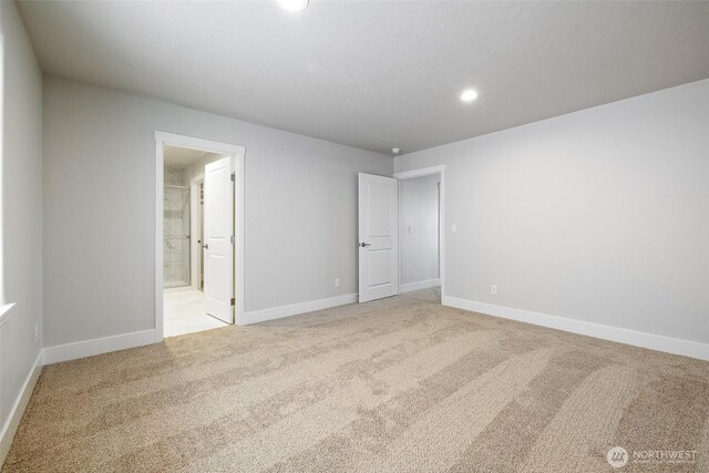 4223 W Sandy Ct, Moses Lake, WA 98837 - unfurnished bedroom featuring carpet floors, baseboards, recessed lighting, and ensuite bath